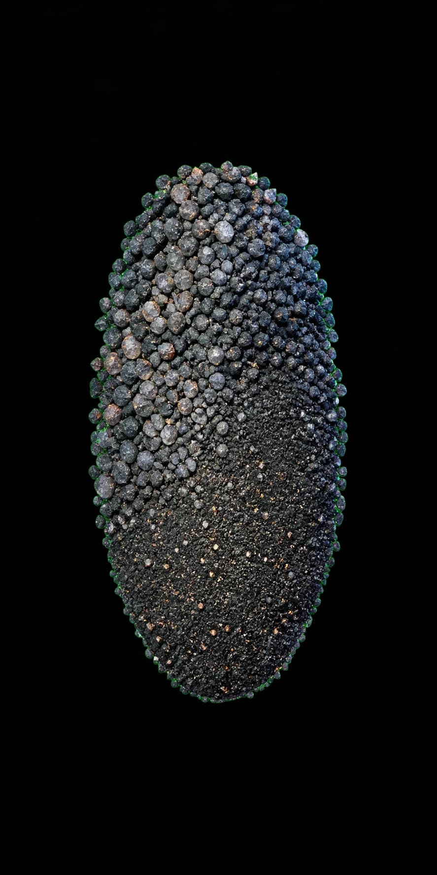 A recovered heavy-mineral concentrate from the same ore.
